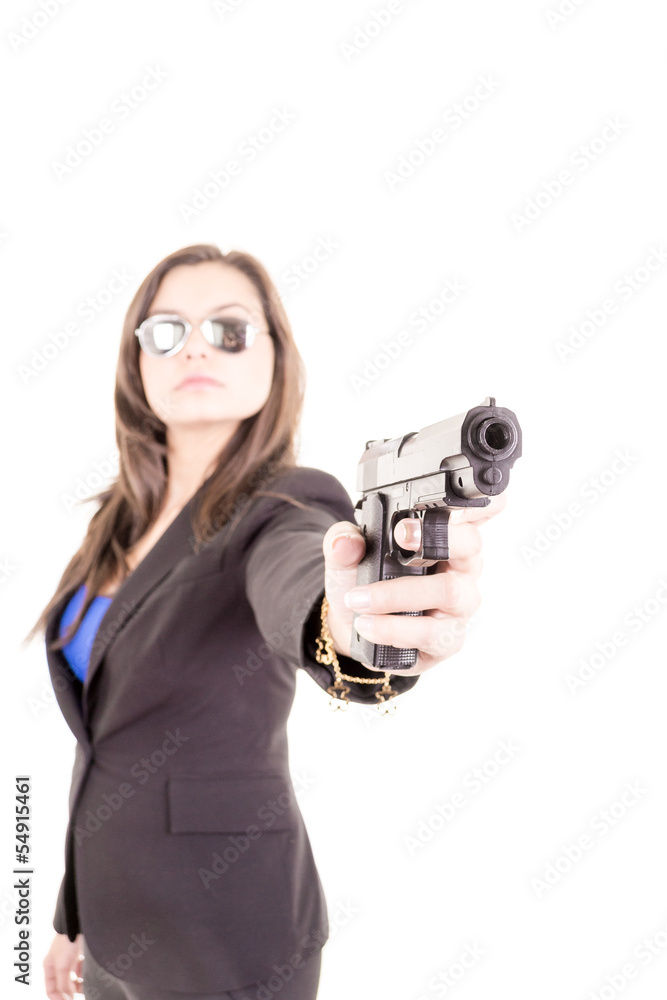 woman in suit and sunglasses holding a gun woman in suit and sunglasses holding a gun