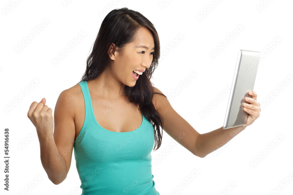 Exciting Asian Woman excited with digital tablet Exciting Asian Woman excited with digital tablet