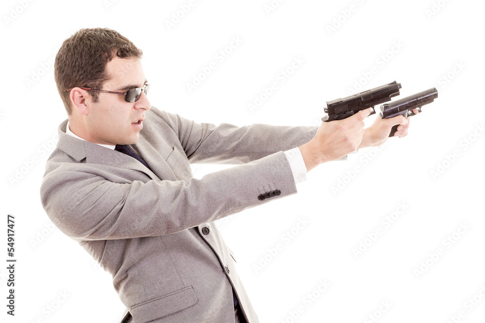 Businessman with gun isolated on white Businessman with gun isolated on white