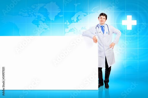 Doctor with blank banner © Sergey Nivens