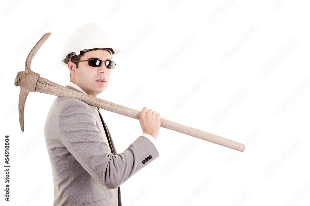 Man in suit displaying pick-axe Man in suit displaying pick-axe