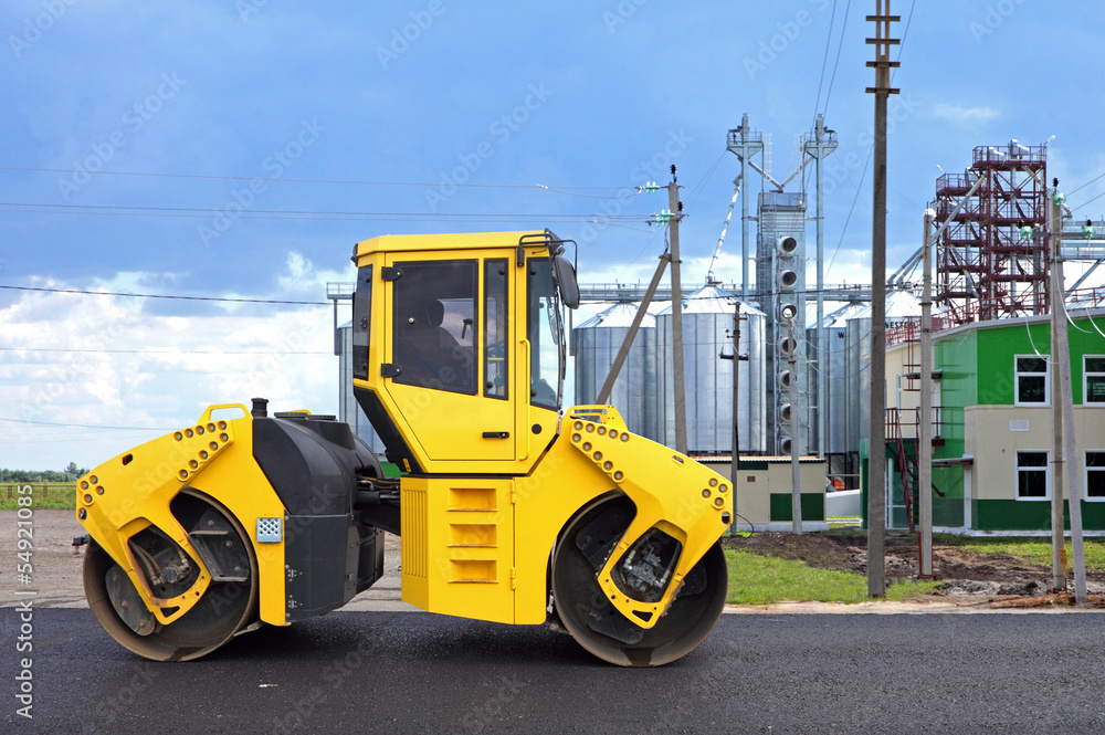 Road roller in a new highway construction Road roller in a new highway construction