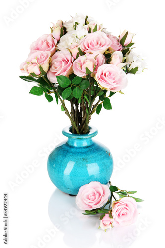 Beautiful pink and white roses in vase isolated on white © Africa Studio