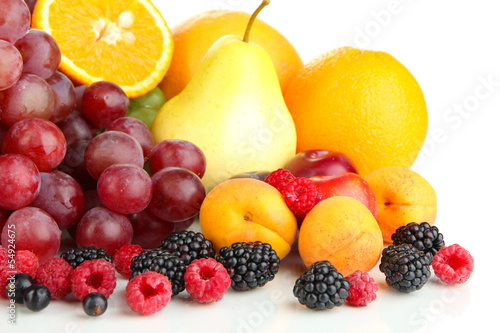 Fresh fruits and berries isolated on white