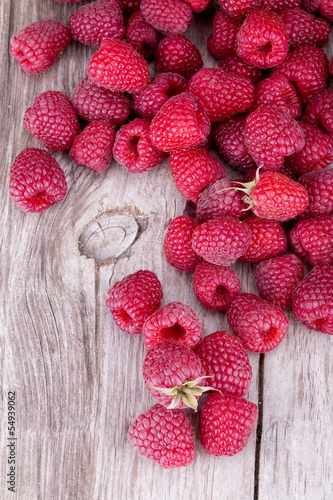 Sweet raspberry on wooden table