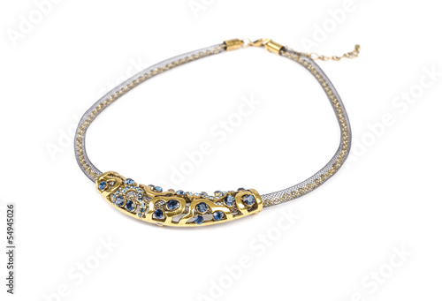 Gold Necklace with Blue Stones on White Background
