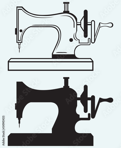 Antique Sewing Machine isolated on blue background