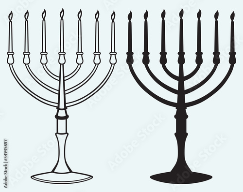 Hanukkah menorah with candles isolated on blue background