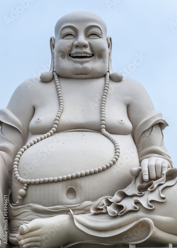 Portrait - Massive white sitting Buddha statue isolated from dec