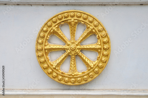 Wheel of law, Dharma on the wall.