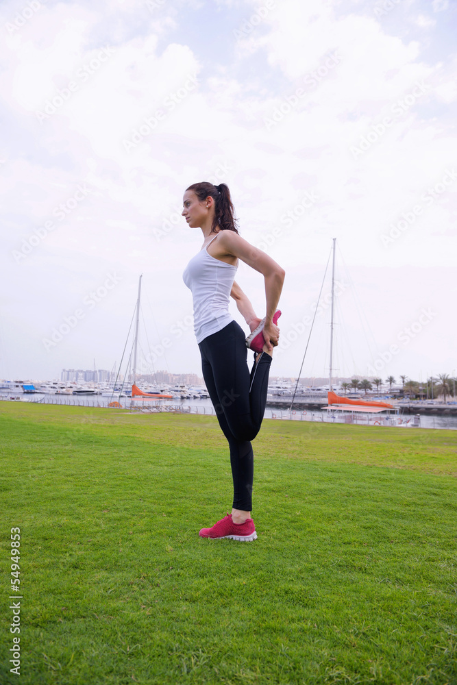 Young beautiful  woman jogging  on morning