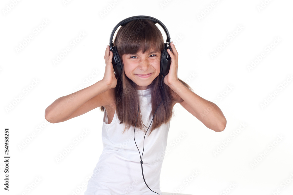 Beautiful cute happy little girl with headphones Beautiful cute happy little girl with headphones