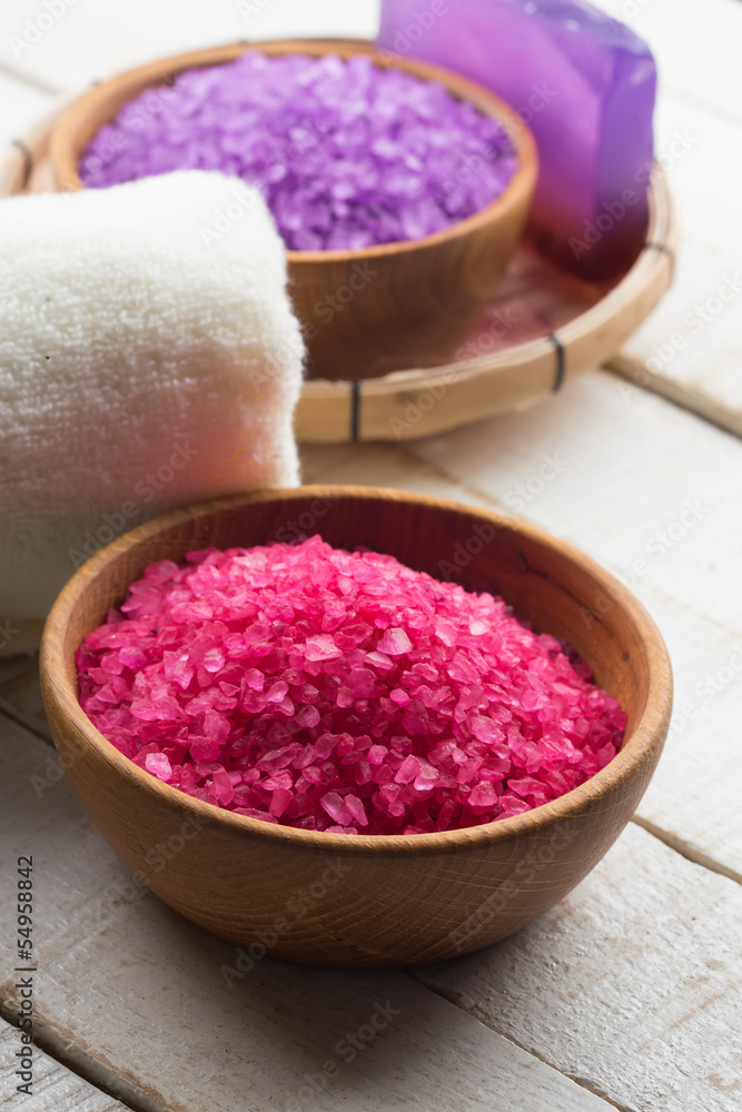 Sea salt in bowl on wooden background Sea salt in bowl on wooden background