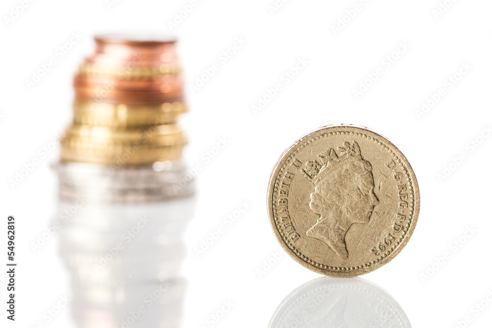 British pound in front of the stack of Euros British pound in front of the stack of Euros