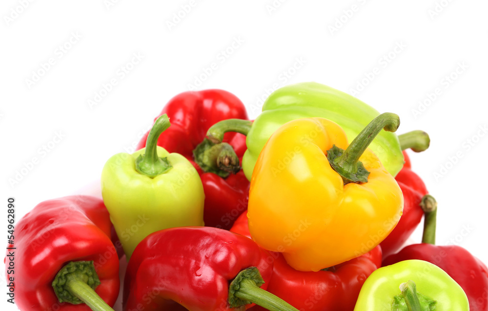 Multi-colored peppers on a white background.
