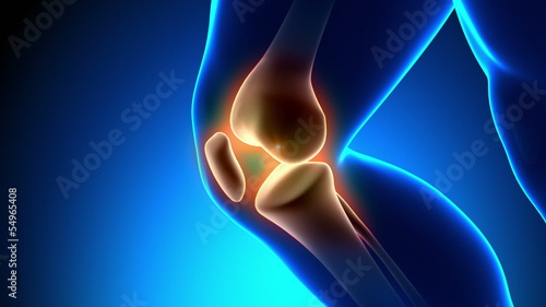 Painful Knee Close-up - Pain on blue background photo