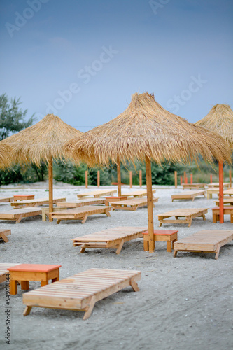Fototapeta Naklejka Na Ścianę i Meble -  Sunbeds on tropical beach