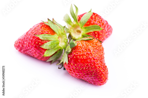 Fresh strawberries isolated on white background.