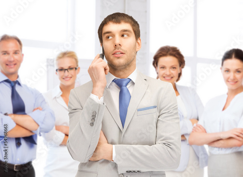 businessman talking on the phone in office