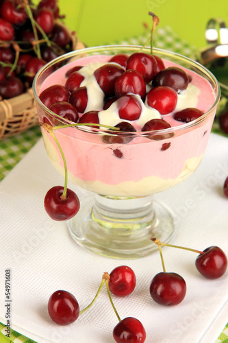 Wallpaper Mural Delicious cherry dessert in glass vase on wooden table close-up Torontodigital.ca