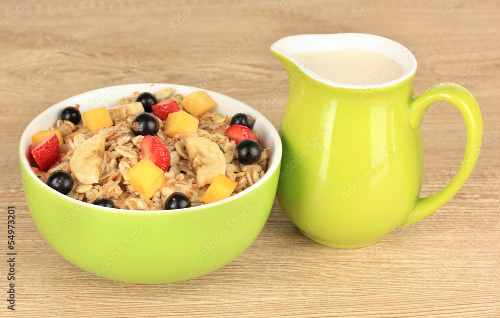 Oatmeal with fruits on table close-up Oatmeal with fruits on table close-up