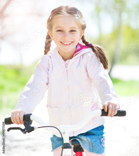 little girl on her bike