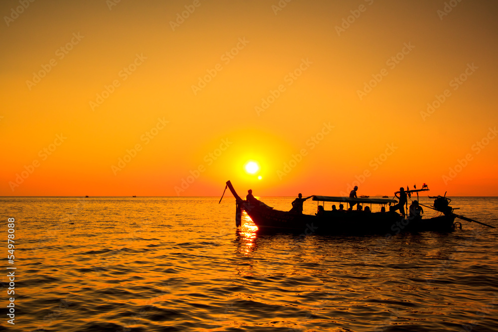 Boat in the sunset near Koh Phi Phi of Thailand