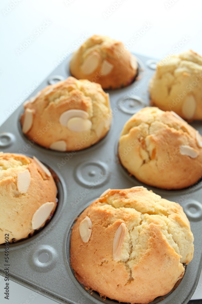 home bakery, almond muffin in mold for bakery food image