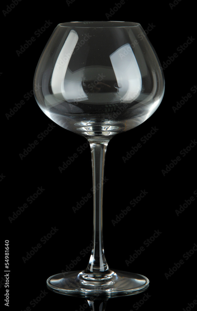 Empty wine glass on black background Empty wine glass on black background