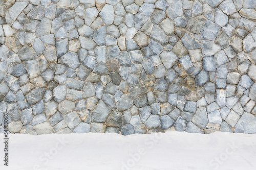 Stone wall beside the sea photo