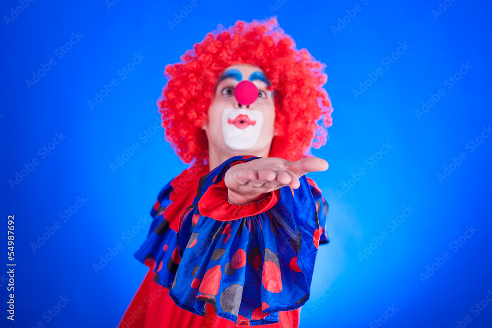 Obraz premium Clown on blue backgound