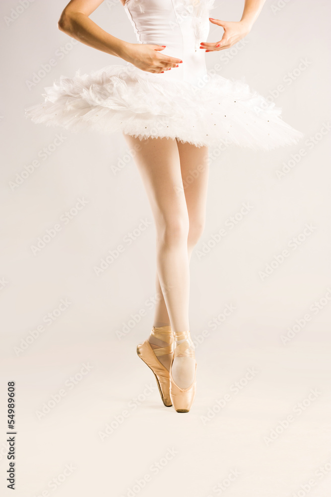 Beauty legs of ballerina on white Beauty legs of ballerina on white