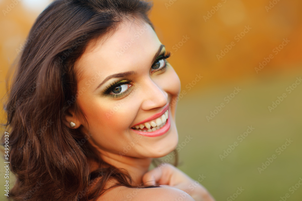 Beautiful Young Woman Outdoors. Healthy Smiling Beautiful Young Woman Outdoors. Healthy Smiling