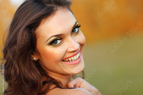 Beautiful Young Woman Outdoors. Healthy Smiling