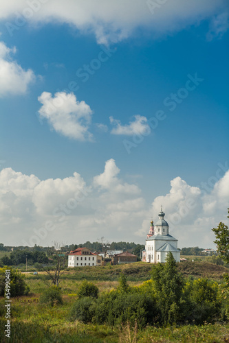 Ancient orthodox temple surrounded with beautiful flat nature