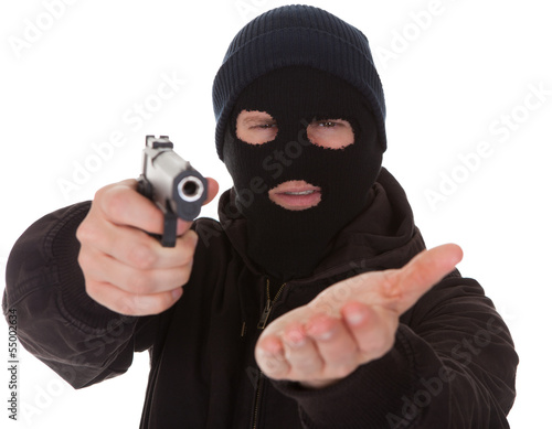 Burglar Wearing Mask Holding Gun