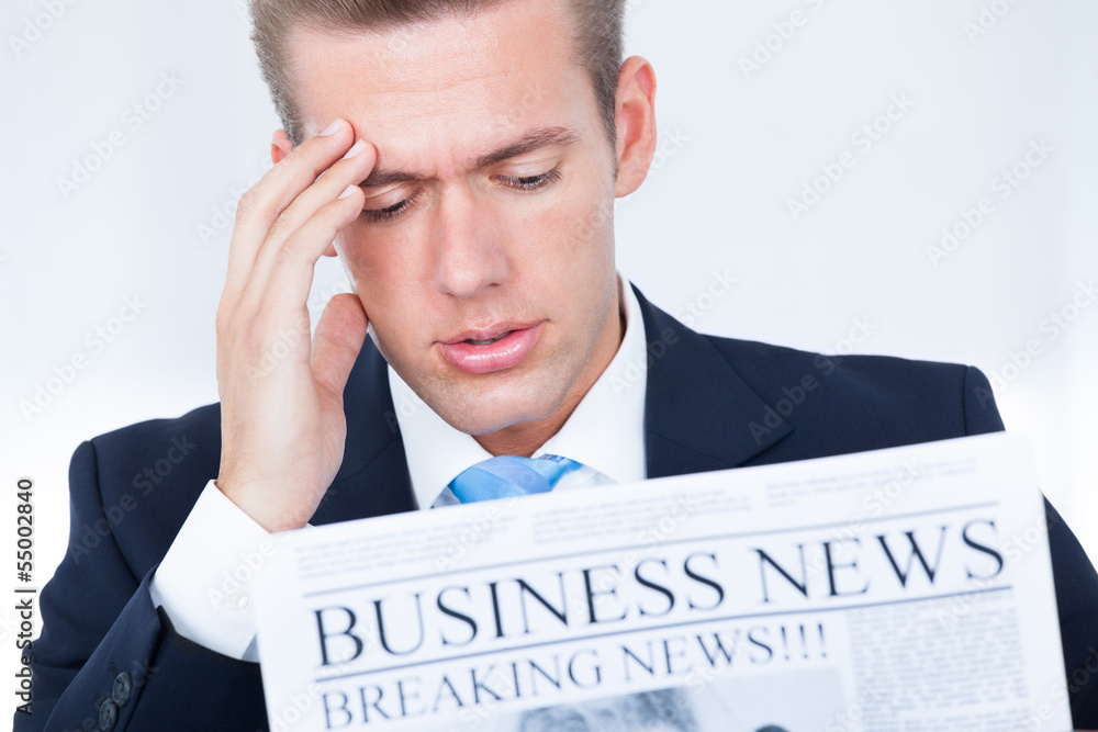 Фотография Businessman Reading Newspaper