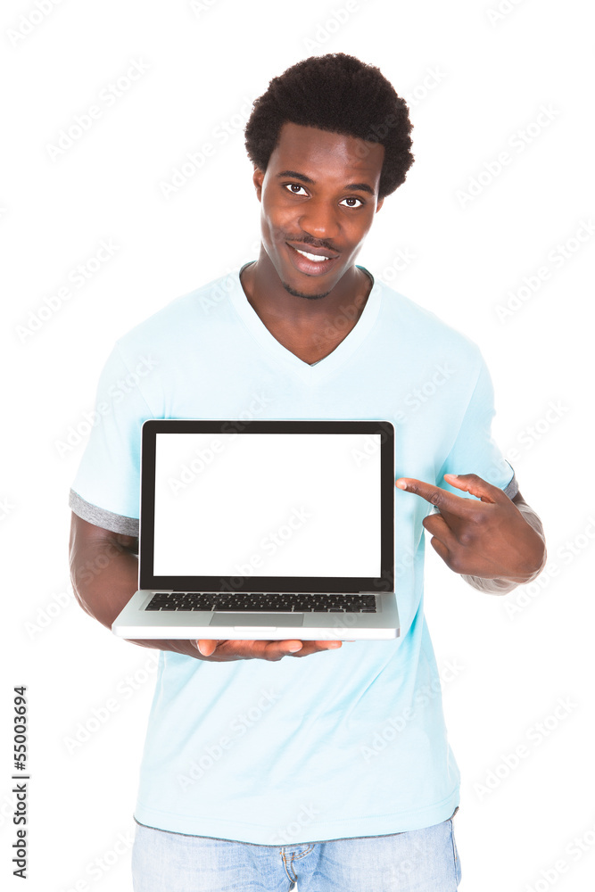 Young Man Using Laptop Young Man Using Laptop