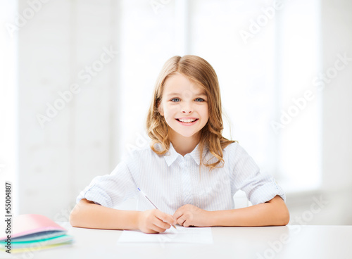 student girl studying at school © Syda Productions