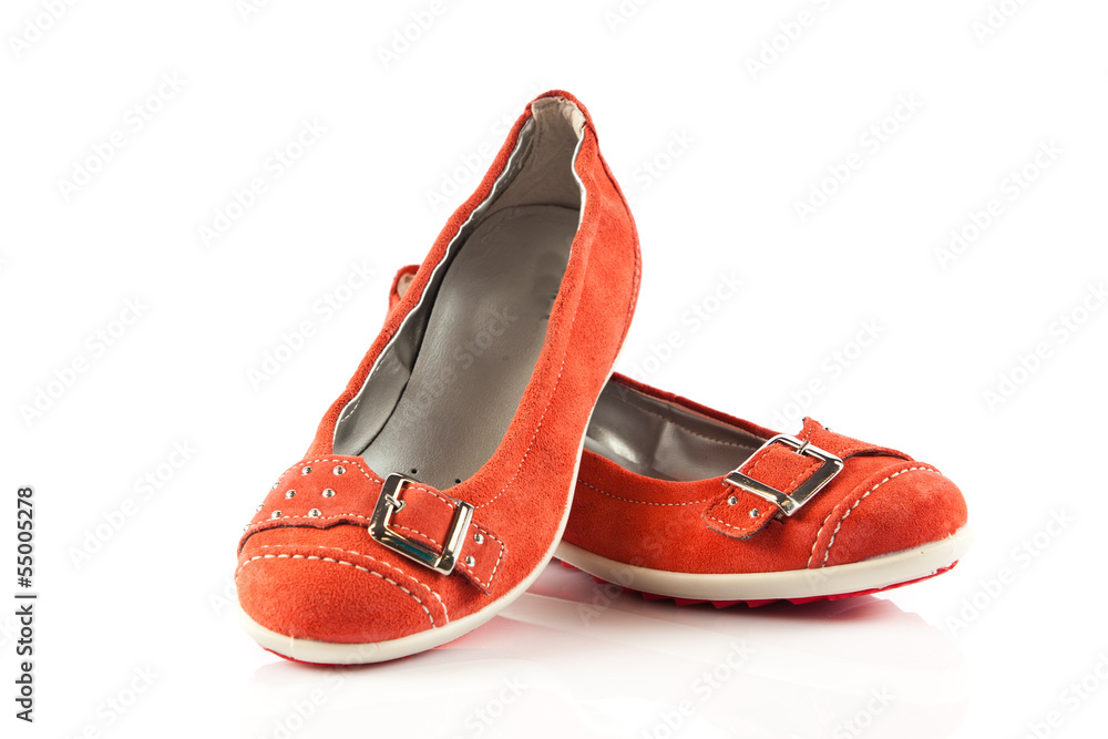 Naklejka premium red shoes on white background.