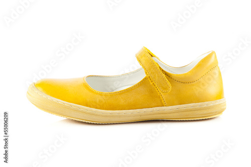 Children's shoes isolated over the white background. yellow sh