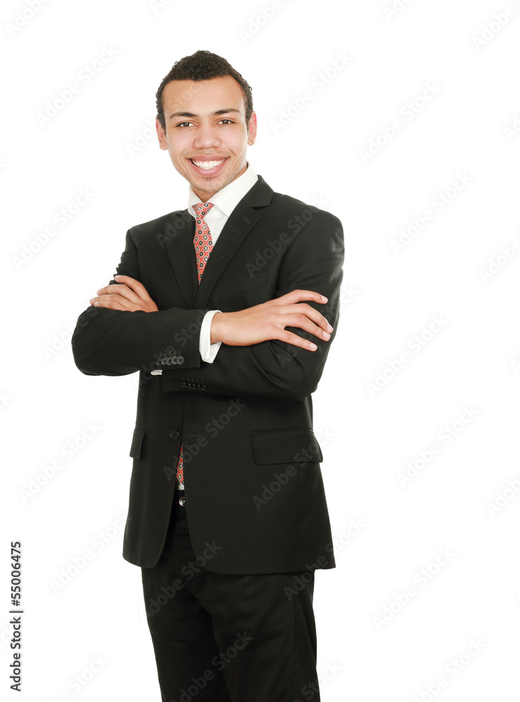 Handsome young business man standing with folded arms Handsome young business man standing with folded arms