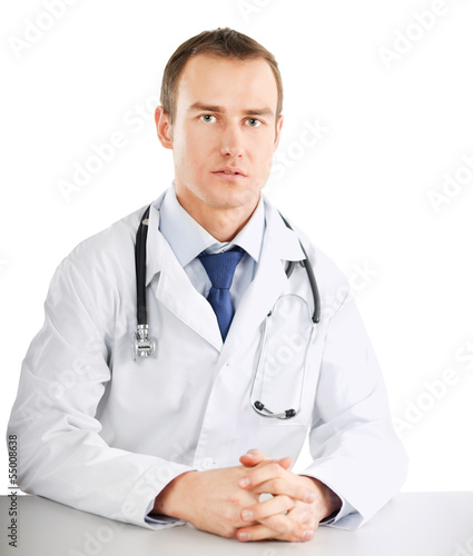 A portrait of a doctor sitting at the desk on white background © lenets_tan
