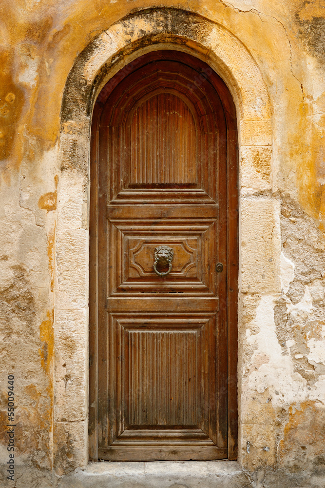 Old wooden door in city of Rethymno, Crete, Greece