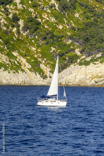 A sailing boat at coast