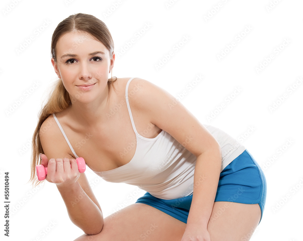 A young woman training, isolated on white background A young woman training, isolated on white background