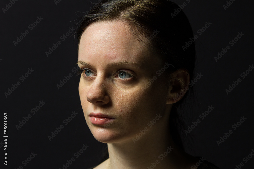 Young woman smiling at camera, vertical Young woman smiling at camera, vertical