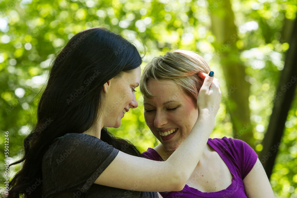 Affectionate lesbian couple, horizontal Affectionate lesbian couple, horizontal