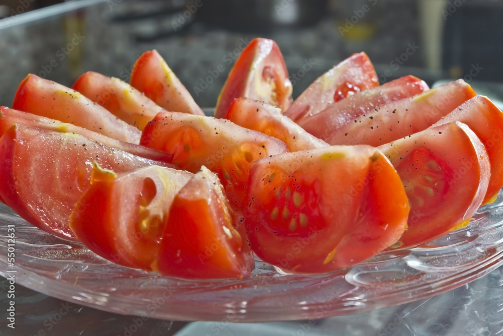 diced tomatoes lying on a plate diced tomatoes lying on a plate
