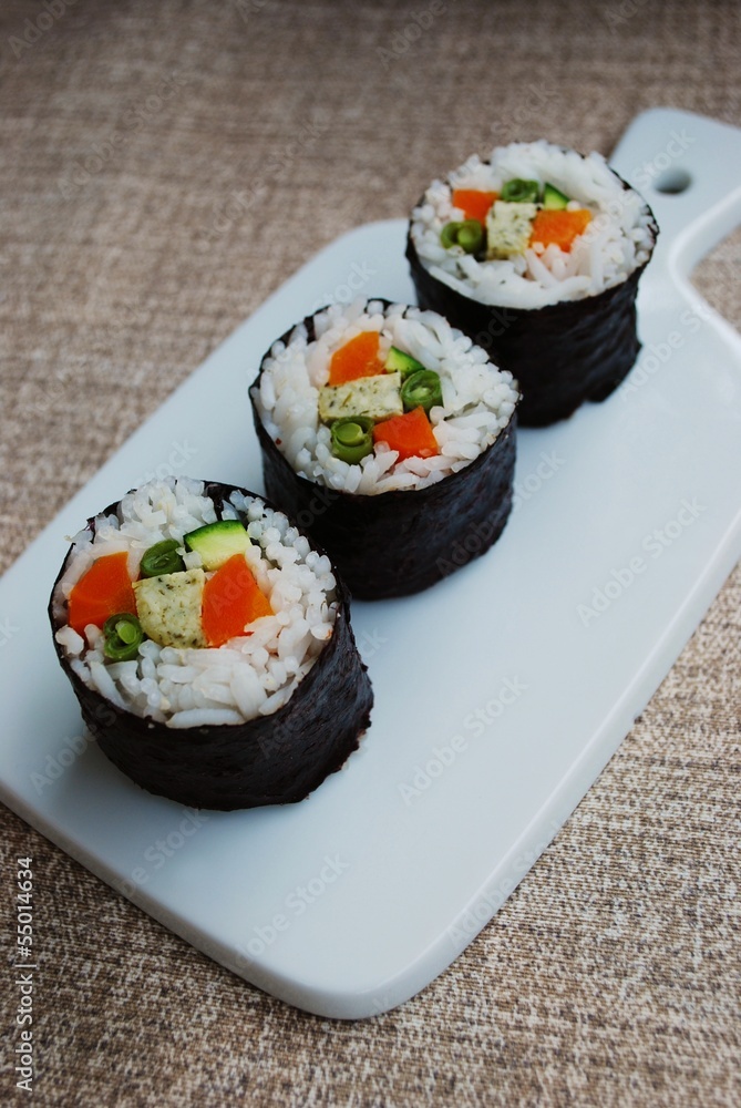 Vegetarian sushi maki rolls with tofu and nori seaweed Vegetarian sushi maki rolls with tofu and nori seaweed